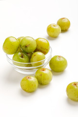 Fresh Indian gooseberry in glass bowl 