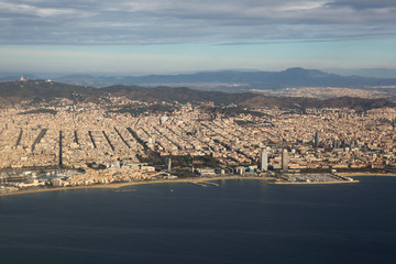 Fototapeta premium Barcelona city and beach seen from the aircraft. Spain