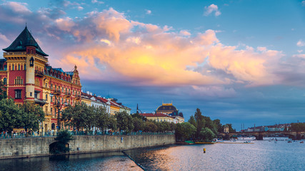 Obraz premium Charles Bridge in Prague in Czechia. Prague, Czech Republic. Charles Bridge (Karluv Most) and Old Town Tower. Vltava River and Charles Bridge. Concept of world travel, sightseeing and tourism.