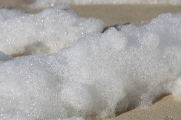 Gischt auf dem Strand