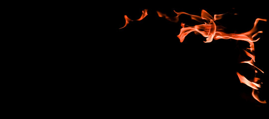 Flames of fire on a black background. The mystery of fire.