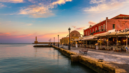 Venetian Harbour of the city of Chania at sunrise with turquoise water, Crete, Greece. View of the...