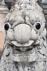 Fototapeta na wymiar White Dragon with Black Eyes Railing Detail Close-up, Tomb of Khai Dinh, Vietnam