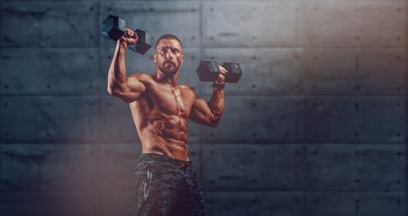 Handsome Athletic Muscular Men Exercising With Weights. copy space - obrazy, fototapety, plakaty