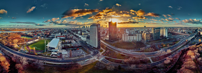 Beautiful panoramic aerial drone view to the Сenter of modern Warsaw city with silhouettes of...