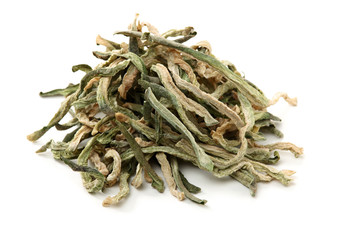 dried green radish slice on white background