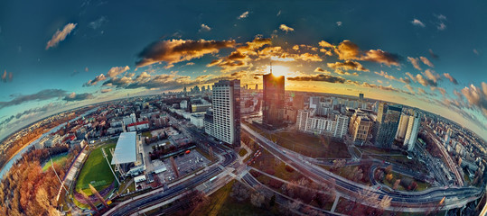 Beautiful panoramic aerial drone view to the Сenter of modern Warsaw city with silhouettes of...