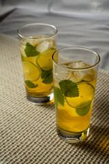 green tea with ice, lime and mint, vertical shot