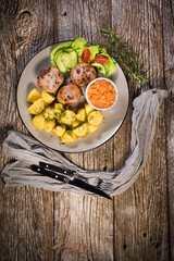 Pork tenderloin wrapped in bacon.