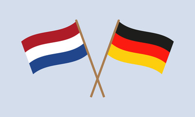 The Netherlands and Germany crossed flags on stick. Dutch and German national symbols. Vector illustration.