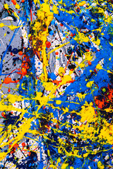 abstract expressonism. Picture painted using the technique of dripping. Mixing different colors red yellow blue white black. Vertcal orientation.