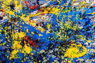 abstract expressonism. Picture painted using the technique of dripping. Mixing different colors red yellow blue white black. Horizontal orientation.