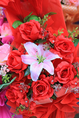 Beautiful bouquet red rose and pink lilly flower.