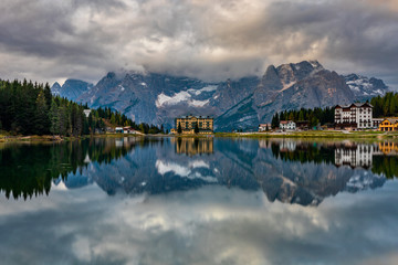 Lake Misurina or Lago di Misurina Italy. Misurina Lake with perfect sky reflection in calm water. Stunning view on the majestic Dolomites Alp Mountains, Italy, National Park Tre Cime di Lavaredo.