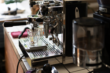 Barista Making Espresso with Coffee Machine