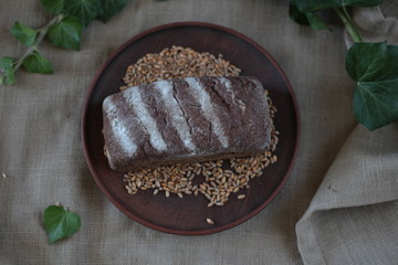 fresh bread on the background of burlap, homemade cakes