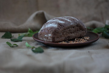 fresh bread on the background of burlap, homemade cakes