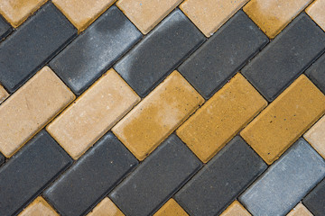 Grey and yellow paving slabs