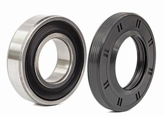 Ball bearing and oil seal for machine repair, isolated on white background