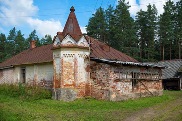 Old brick church building with a small corner tower