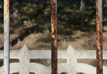 Fototapeta premium rusty iron fence on background