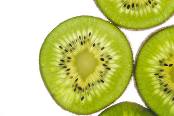 Fototapeta na wymiar round kiwi slices on a white background. Isolated on white. close up