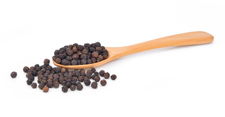 black pepper , spoon on white background