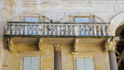 The building with a balcony, located on the Peristyle of the palace of Emperor Diocletian, opposite the bell tower