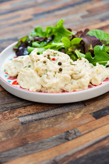 Traditional Parmentier of fish with chives