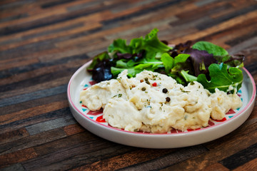 Traditional Parmentier of fish with chives
