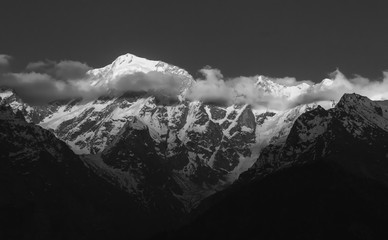 A grayscale shot of the Kinner Kailash mountains as seen from the village of Kalpa in Kinnaur in...