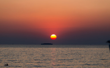 the sky in sunset time  at Bang Pu Resort, Thailand. decoration image contain certain grain noise and soft focus.