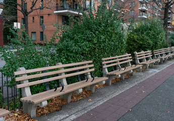 Empty Wood Benches at a Pocket Park in Midtown Manhattan along the East River in New York City