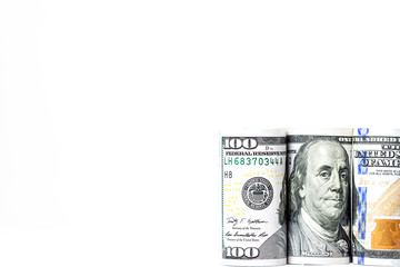 rolls of USD bills on white background composition space for economic issue