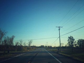 Fototapeta premium Autumn road in the afternoon