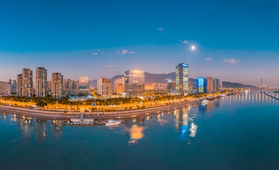 Fototapeta na wymiar Urban night view of CBD of strait financial street and CBD of jiangnan district, fuzhou city, fujian province, China