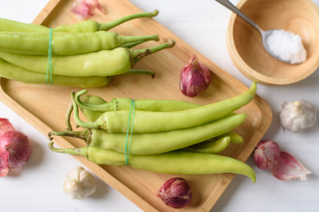 Food ingredients for making Nam Prik Num (Northern Thai Green Chilli Dip), Northern Thai local food on white background
