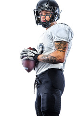 American football player in helmet isolated on white background. Sport wallpaper. © Mike Orlov