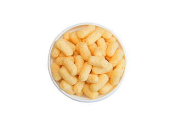 corn sticks that are in a white cup on the table top view isolate