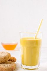 indian drink golden milk next to a swirl. have copy space