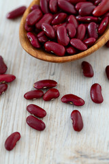 red beans in a wooden spoon
