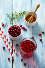 cranberry drink on wooden surface