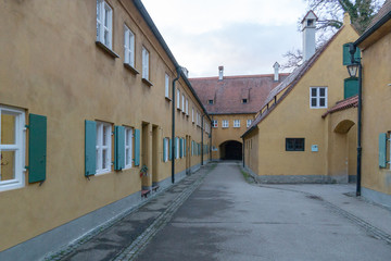 Fototapeta na wymiar Fuggerei in Augsburg, Bavaria, Germany