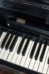 Fototapeta na wymiar Piano keyboard background selective focus white black