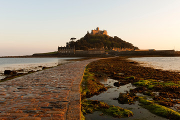 St Michael's Mount, Cornwall showing the causeway at low tide in golden light