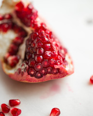 fresh and juicy pomegranate on marble background