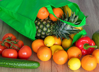 Green grid with healthy food on the kitchen table