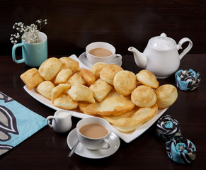delicious fried buns with fragrant tea