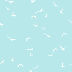 Seamless abstract pattern with white flying birds on blue background. Vector illustration.