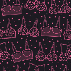 Vector lingerie texture pattern in pink and black. Simple outline bra hand drawn made into repeat. Great for background, wallpaper, wrapping paper, packaging, fashion.